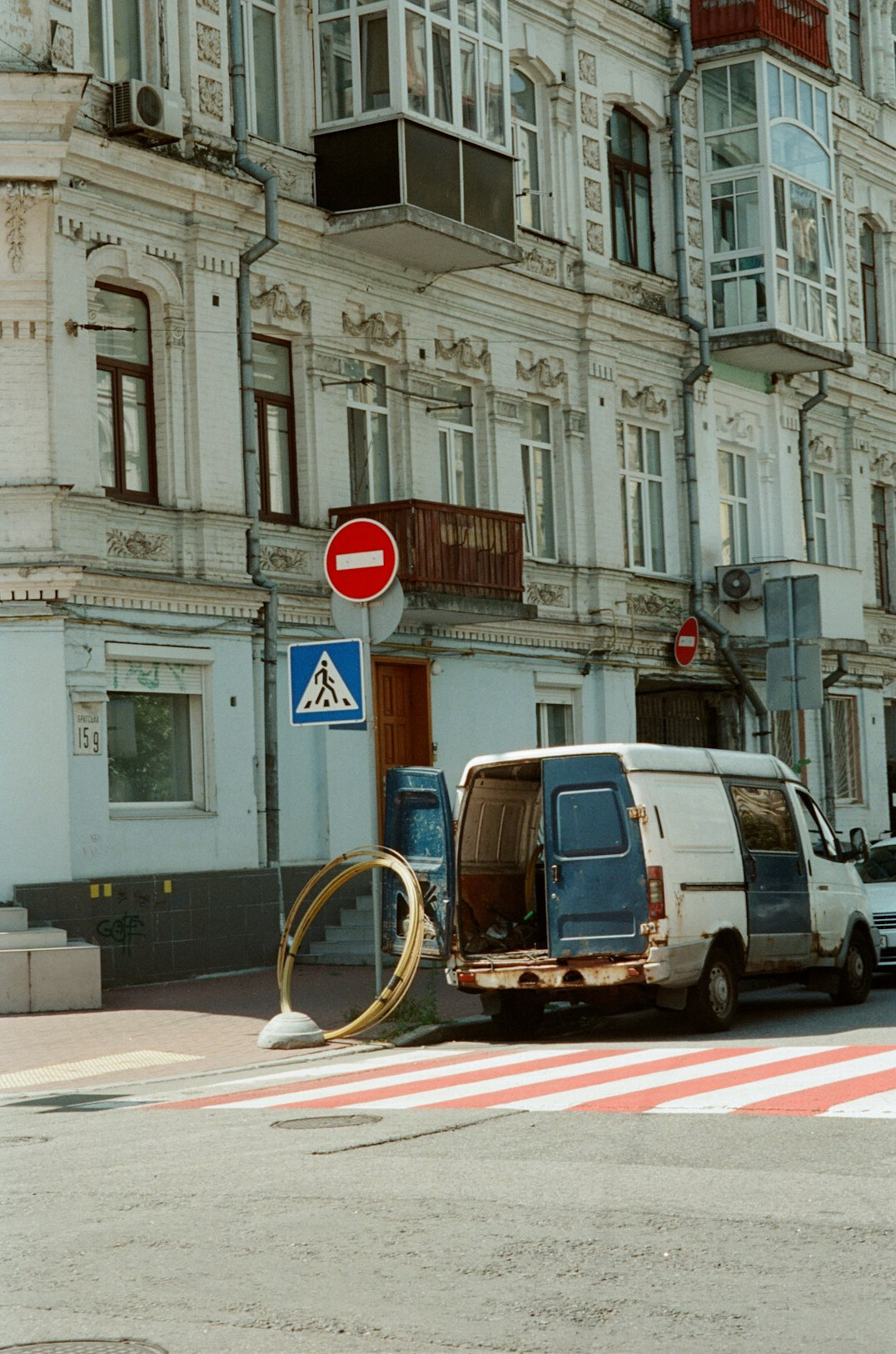 Outside broadcast van with satellite dish on a city street